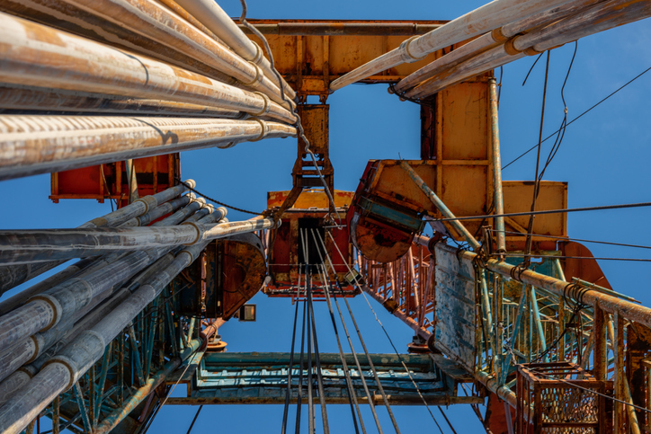 Oil drilling rig operation on the oil platform in oil and gas industry. Industrial concept. Toned
